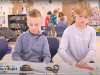  2 students working at a desk